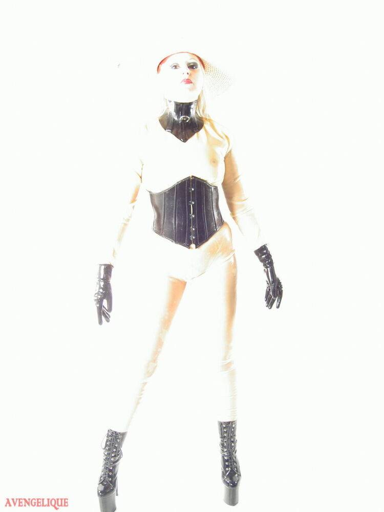 Sexy blonde Avengelique models a sun hat while wearing rubber clothing - #6