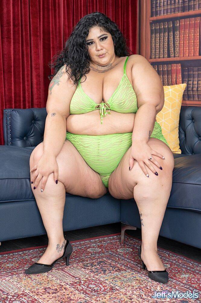 SSBBW Crystal Blue strips down to her footwear on a sofa during solo action - #15