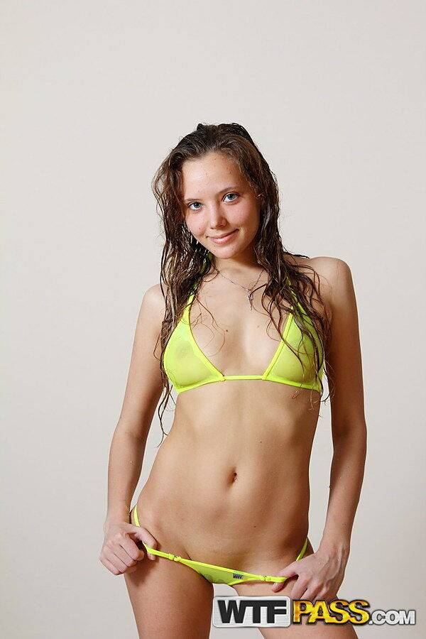 Teen amateur Katya models a skimpy bikini after a bubble bath - #10