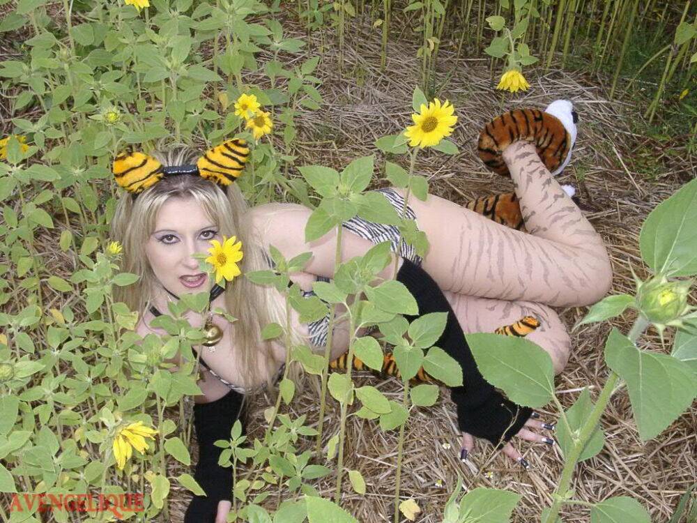 Blonde girl Avengelique models in her pretties and arm socks amid sunflowers - #8