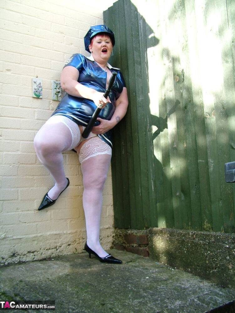 Mature plumper Valgasmic Exposed models latex police attire in white stockings - #15