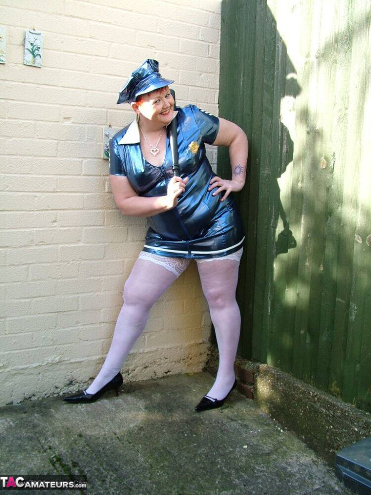 Mature plumper Valgasmic Exposed models latex police attire in white stockings - #7