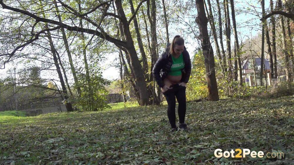 White girl Naomi Bennet takes a piss in a park on a chilly day - #2