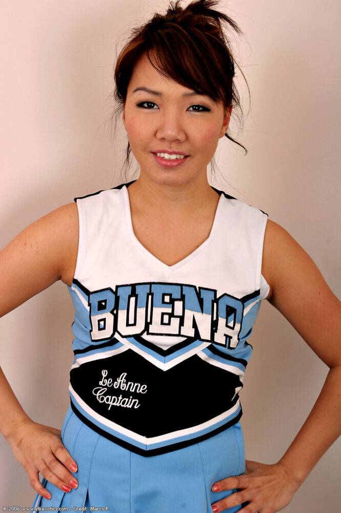 Amateur Asian solo girl sheds cheerleader uniform to bare tiny teen tits - #5