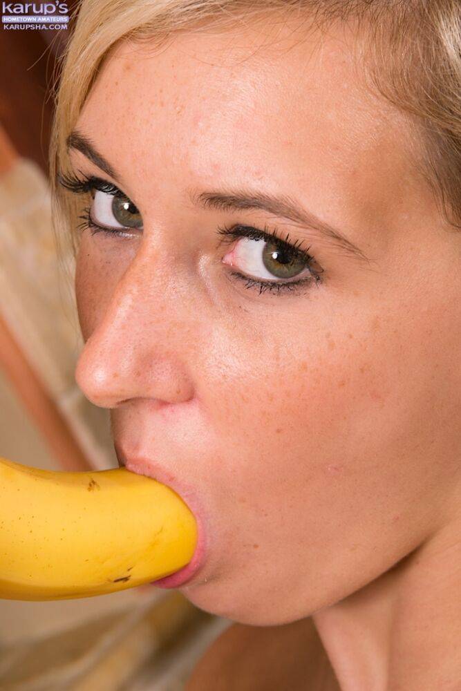 Nude teenage hottie Lily Banks playing with banana in the kitchen - #11