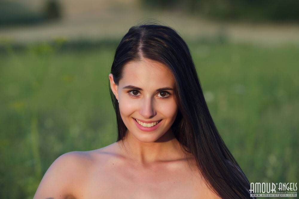 Dark haired teen Vanessa reveals her naked body in a farmer's field - #15