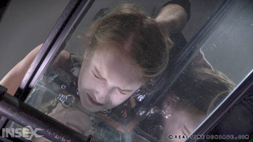 Restrained female Ashley Lane endures having her face submerged in water - #6