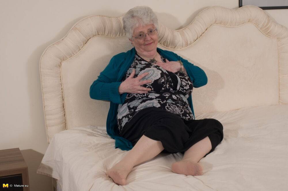 Overweight British grandmother covers her naked boobs with her hands - #2