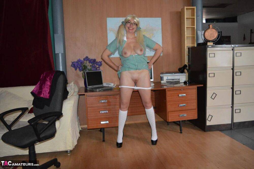 Older blonde Barby Slut exposes herself while wearing schoolgirl clothing - #5