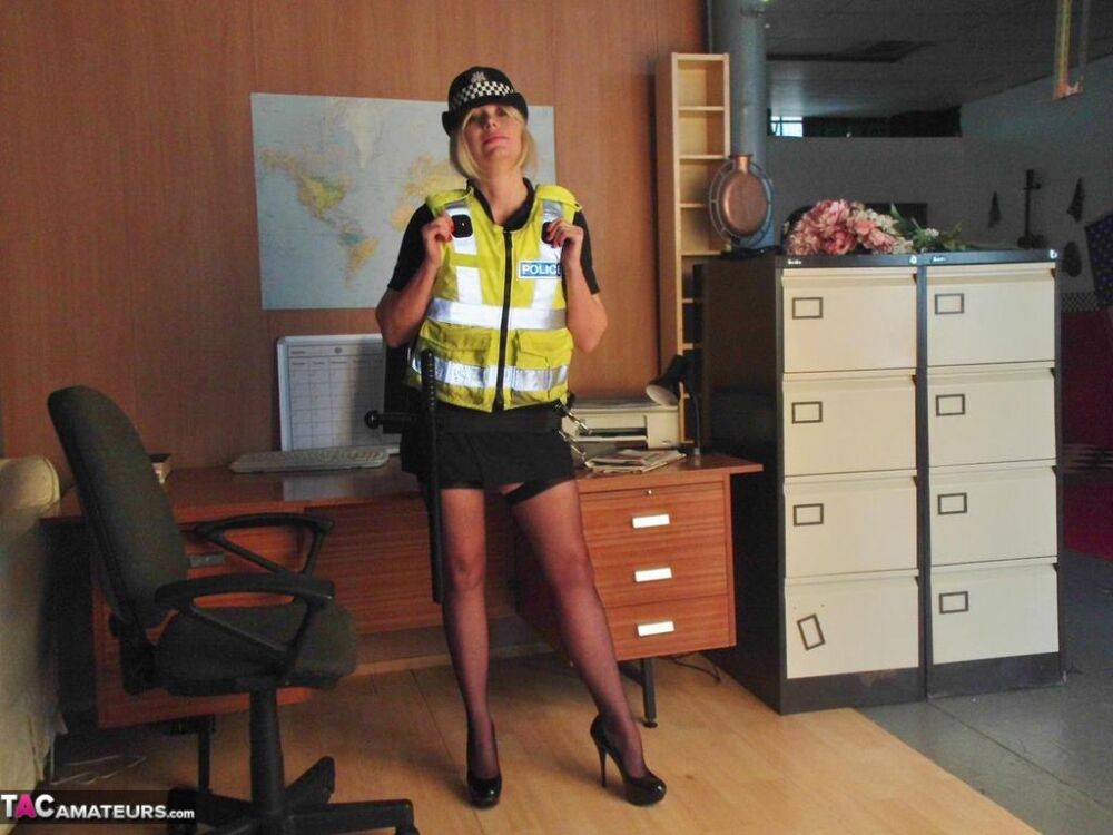 Mature UK policewoman Barby Slut sets her tits free of her uniform - #12