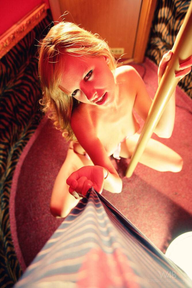 Sexy blonde Carmen Kees works a stripper pole in high-heeled shoes - #9