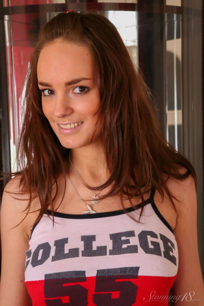 College girl Milana F uncovers her full breasts while getting butt naked - #11