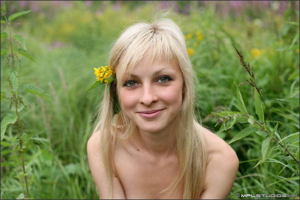 Blonde solo girl wanders around in the long grass with any clothes on - #2