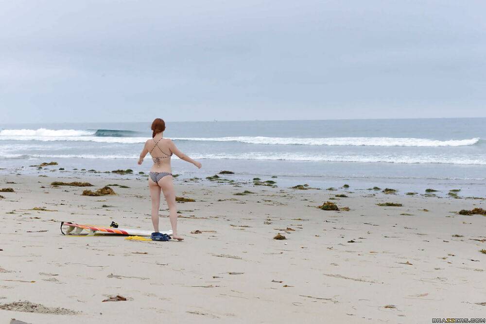 Ginger girl with large ass Penny is showing her skills on the beach - #6