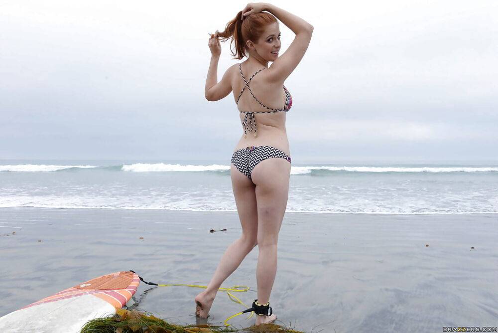 Ginger girl with large ass Penny is showing her skills on the beach - #8