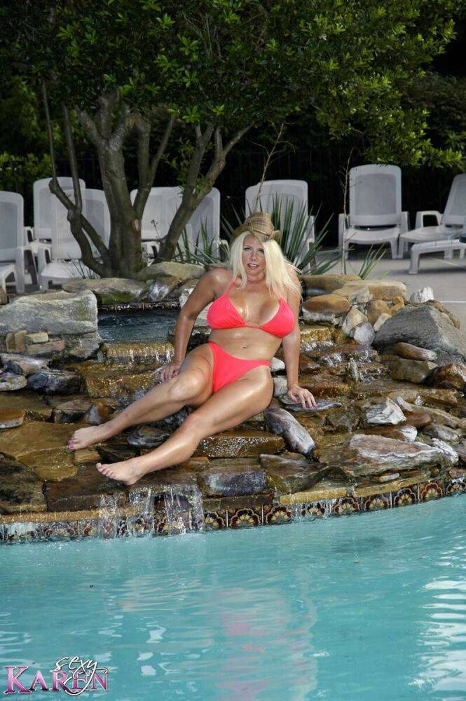 Karen strips off her bright orange bikini while getting some sun poolside - #6