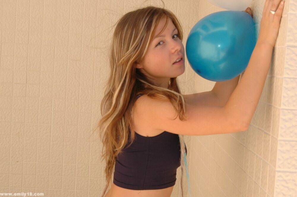 Sweet emily playing with a blue balloon - #10