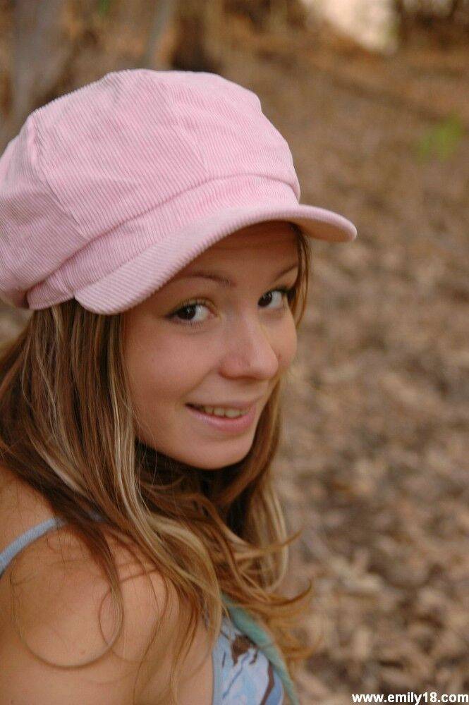 Adorable young girl goes topless on a blanket in the woods - #13