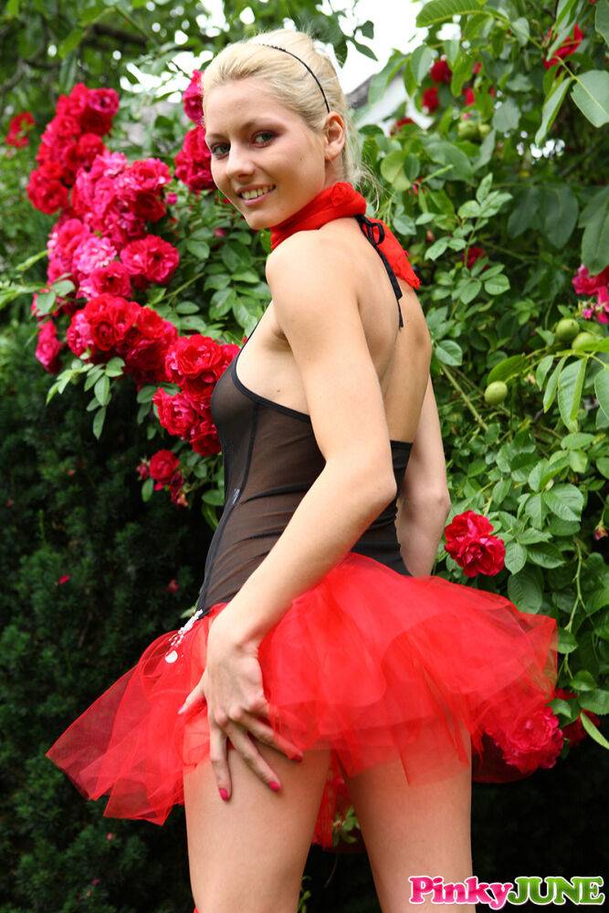 Young blonde Kaira 18 fingers her pussy by the rose bushes in a tutu - #12