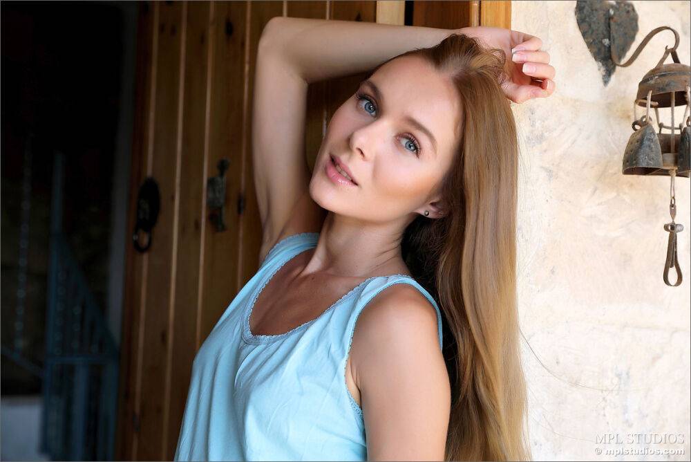 Teen model goes topless on a veranda prior to pulling down her underwear - #3