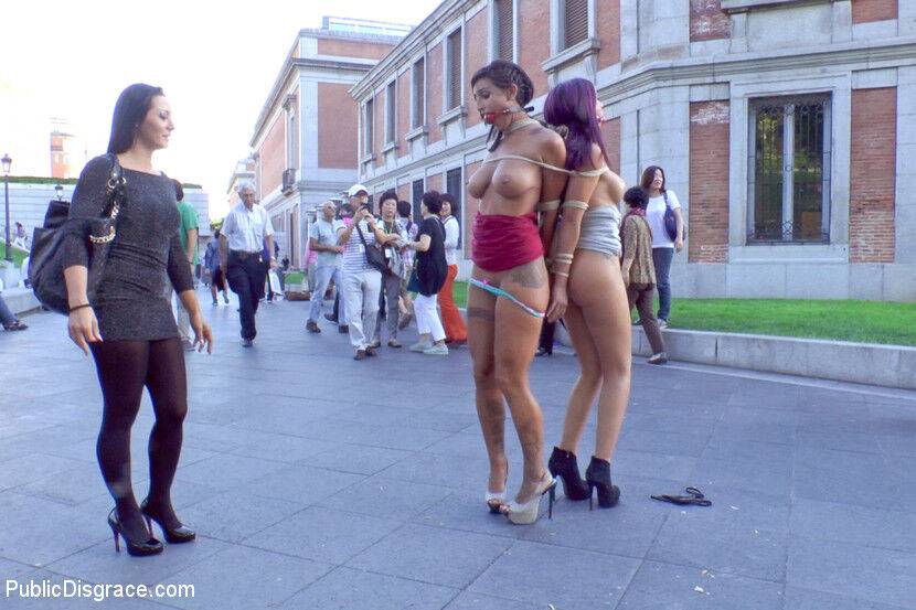 Beautiful girls are tied together during a public humiliation session - #12