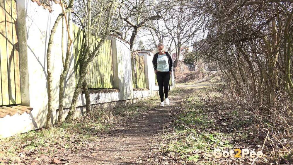 Naomi Benet pees near abandoned building - #14