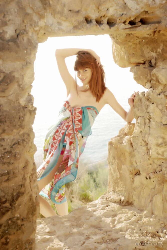 Iren F shows off her tight body with perky tits as she poses at the cave - #16