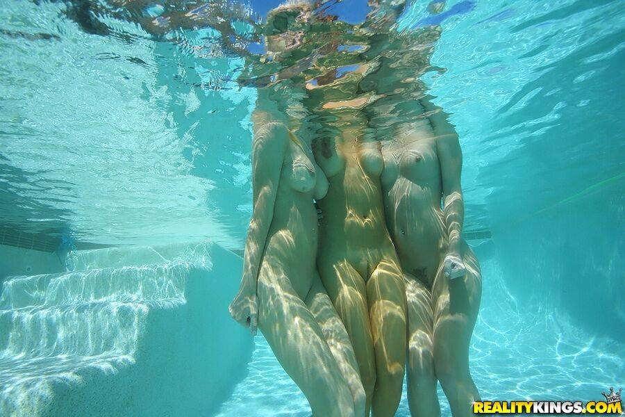 Three lesbian hotties in bikini stripping and licking pussy underwater - #14