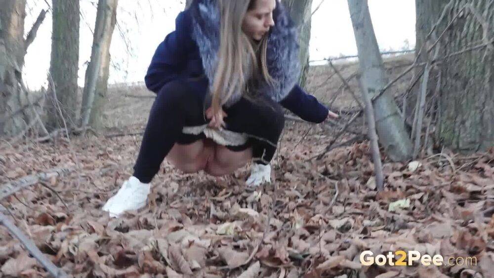 Short taken girl pulls down tights to take a pee while walking thru the woods - #7