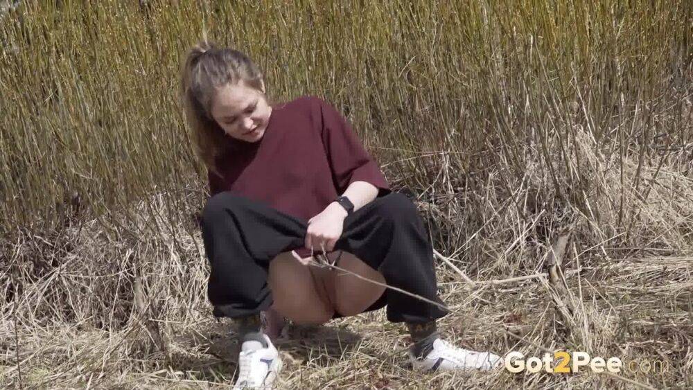 European babe squats on wasteland to piss - #6