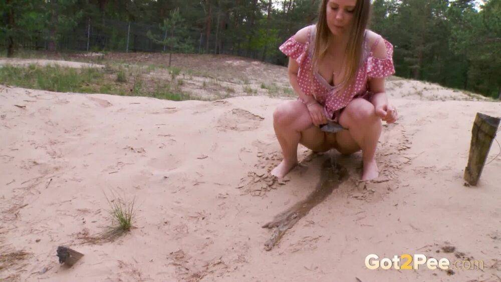 Distressed girl Nastya squats for an urgent piss on a sandbank - #6