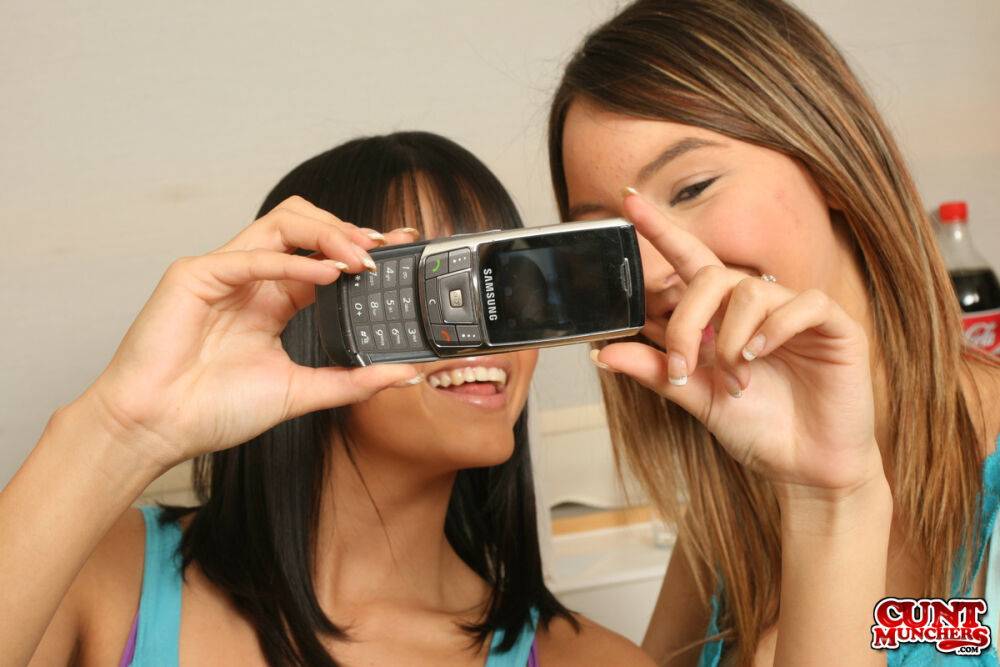 Teen lesbians Katie K & Sasha Bangs takes selfies while kissing in a kitchen - #15