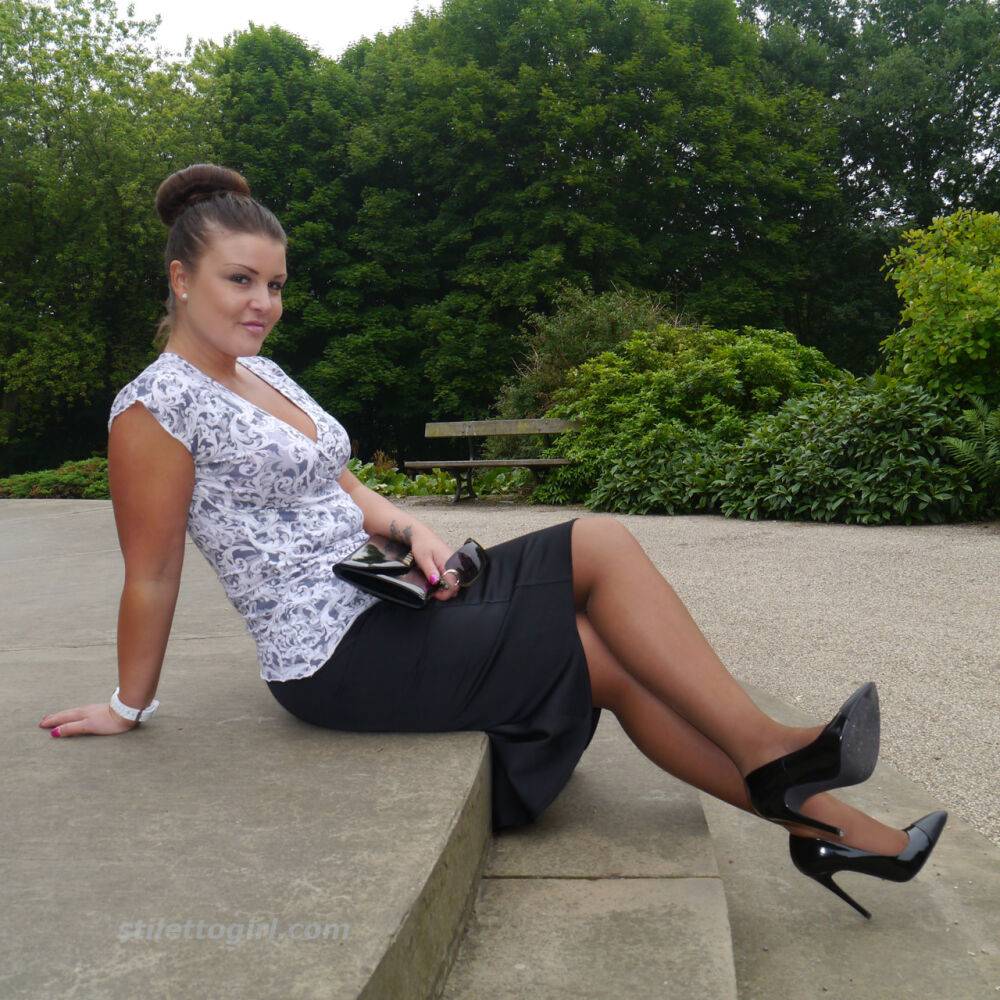 Clothed woman Karen displays her new stiletto heels at a park - #13