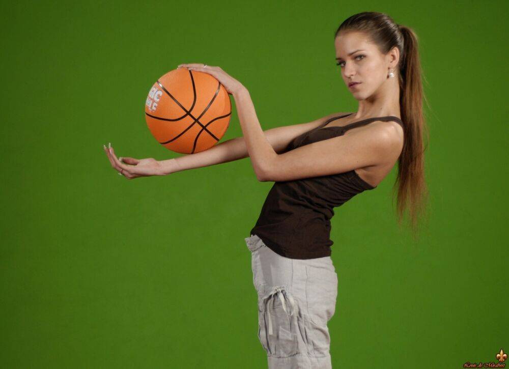 Solo girl Silvie Deluxe plays with a basketball while showing her firm tits - #16