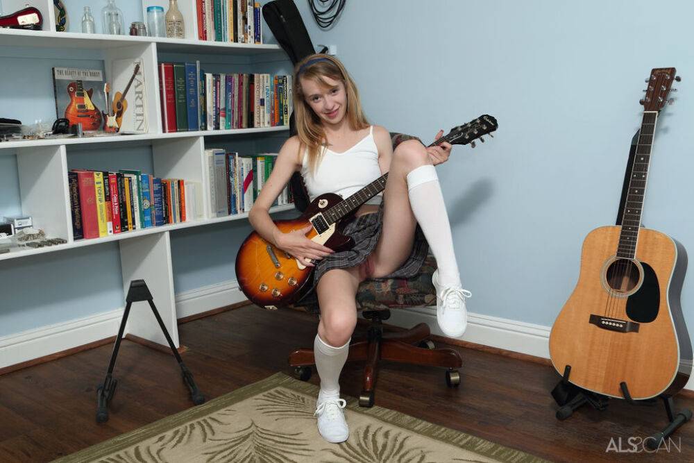 Young looking girl Kristy May toys her pussy in white knee socks and sneakers - #14