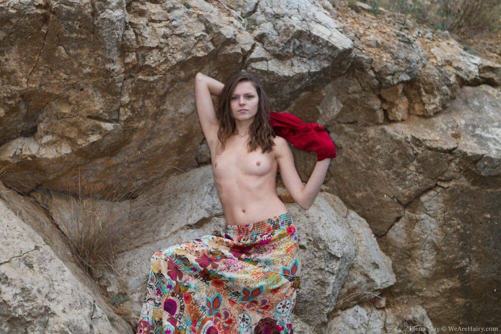 Solo girl Elena May climbs a rock face before spreading her hairy pussy - #15