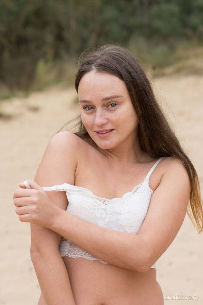 Sweet teen Alice Koks gets butt naked on a sandy beach by herself - #14