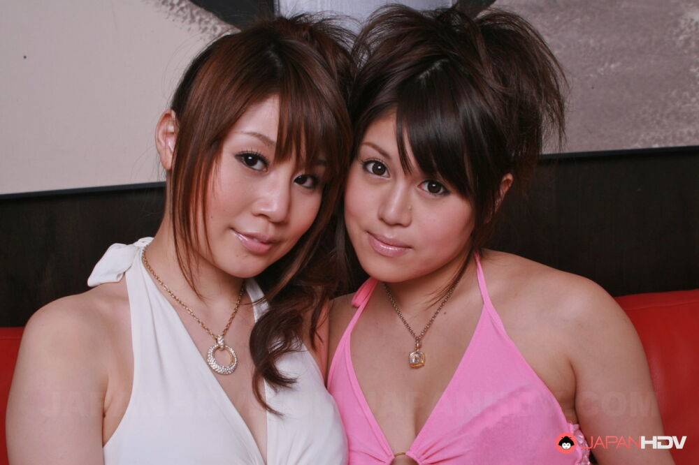 Japanese lesbians Alice Mizuno & Honami Isshiki free boobs from dresses - #7