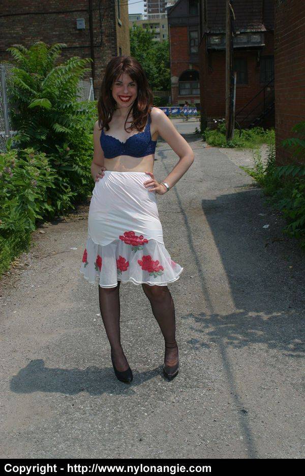 Amateur chick Dirty Angie wanders down main street in a girdle and nylons | Photo: 3471521