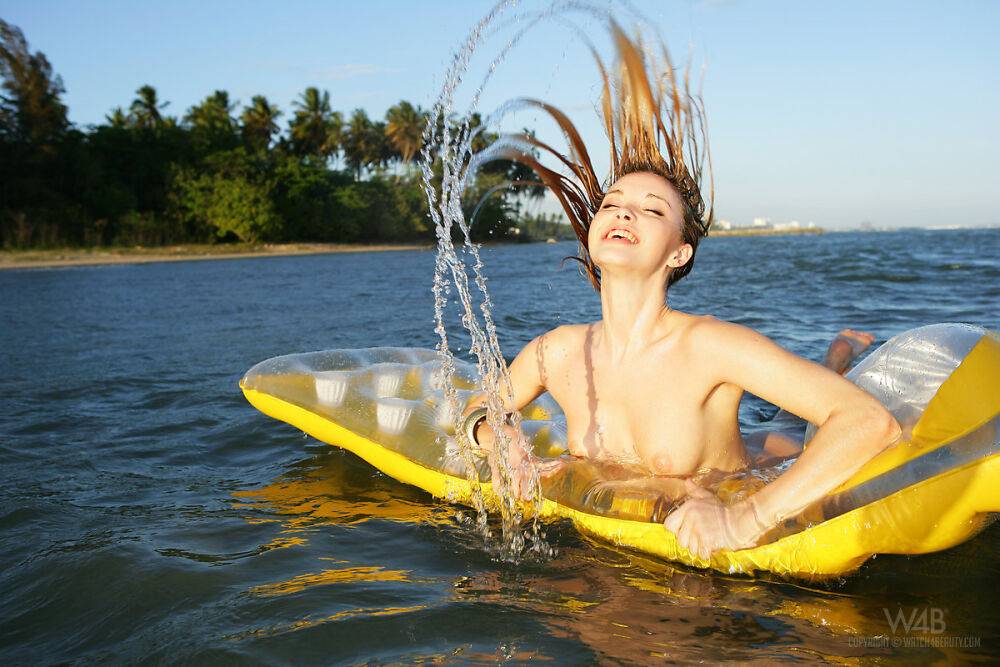 Topless girl Alissa White takes off her wet bikini bottoms on an air mattress - #7