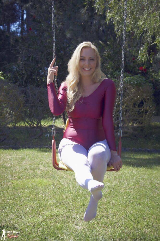 Busty blonde Hayley Marie Coppin strips bodysuit and white pantyhose outdoors - #4