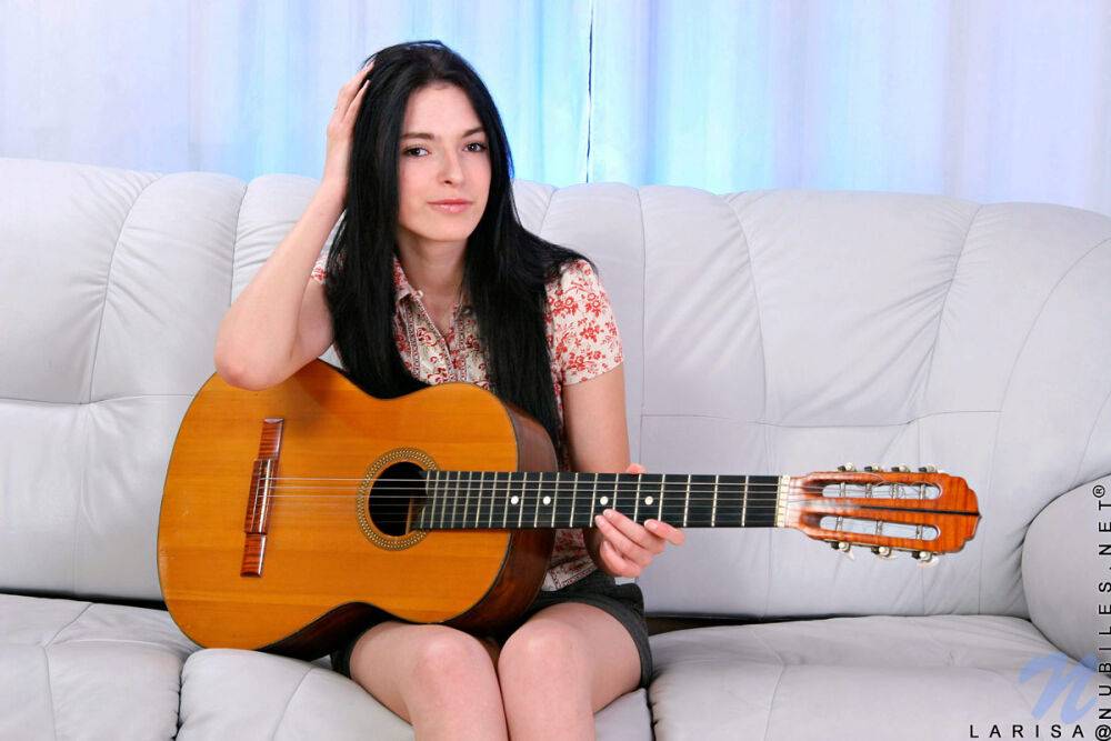 Young brunette puts down her guitar and proceeds to masturbate in white socks - #8