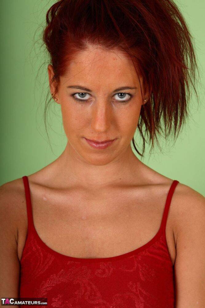 Skinny redhead Susy Rocks takes a big dildo to her shaved vagina - #2