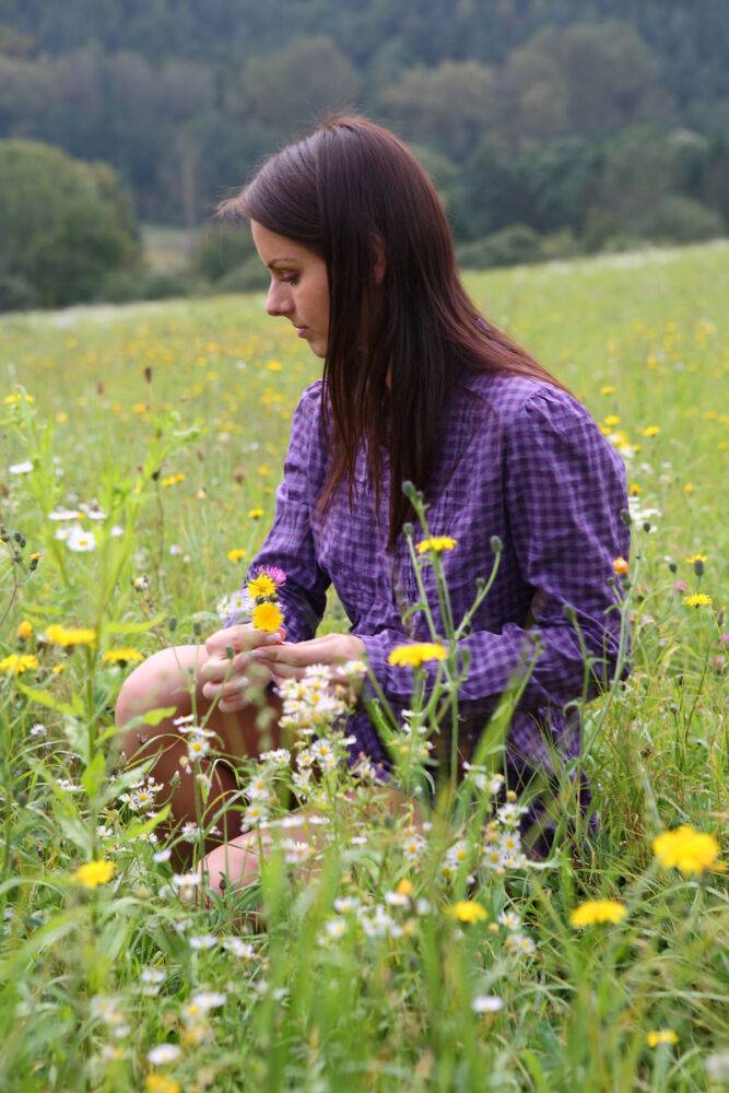 Young girl gets totally naked while picking flowers in a rural field - #10