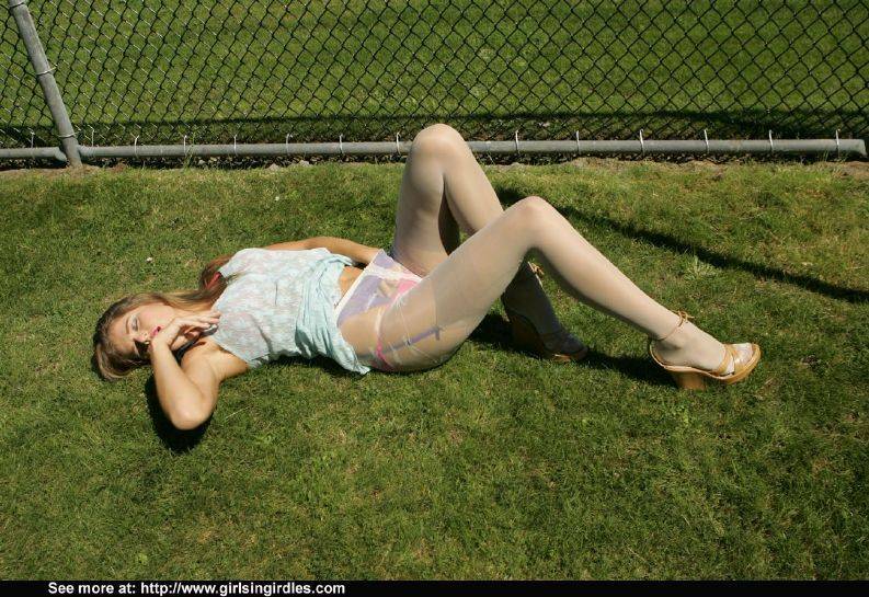 Lusty babe in pantyhose teasing her cunt under her panties outdoor - #8