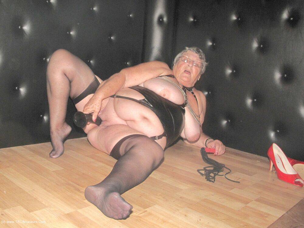 Obese UK lady Grandma Libby toys her pussy while in a dungeon - #1