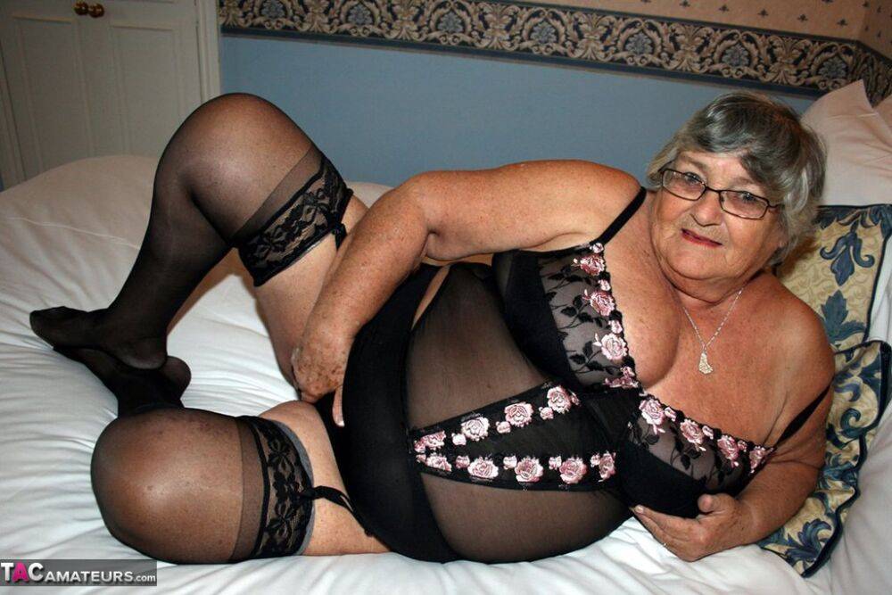 Nerdy Grandma Libby inserting a huge black dildo inside her fat pussy - #6