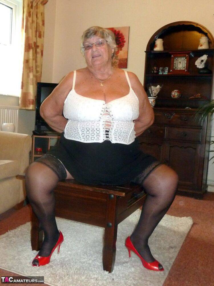 Obese oma Grandma Libby uncovers her large boobs in her underwear and hosiery - #1