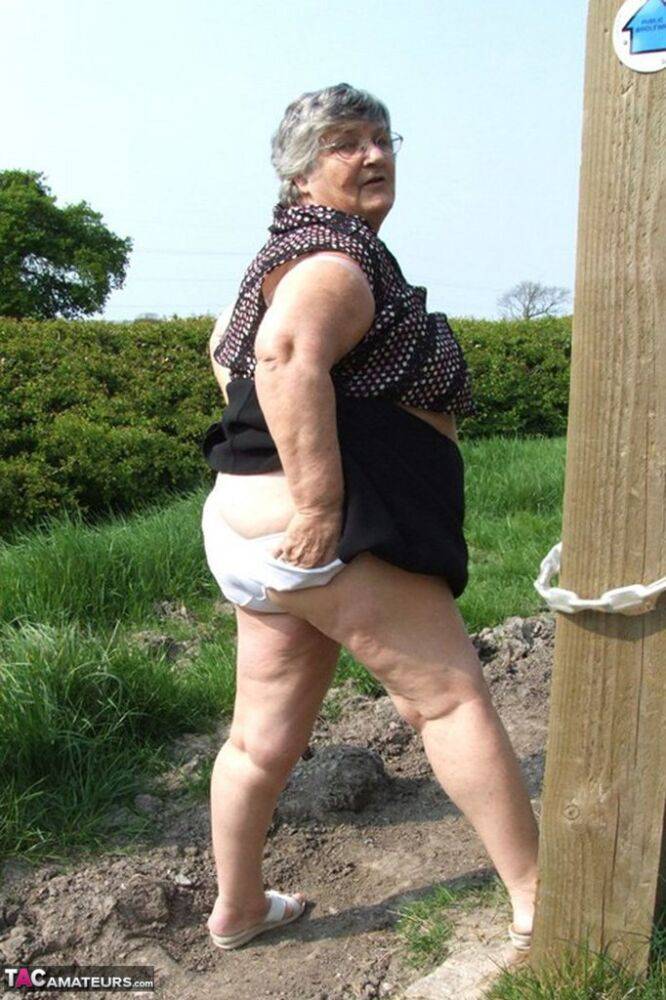 Horny granny Grandma Libby exposes massive big tits and huge ass at the farm - #16