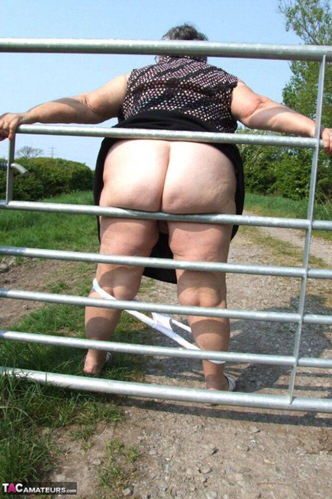 Horny granny Grandma Libby exposes massive big tits and huge ass at the farm - #14